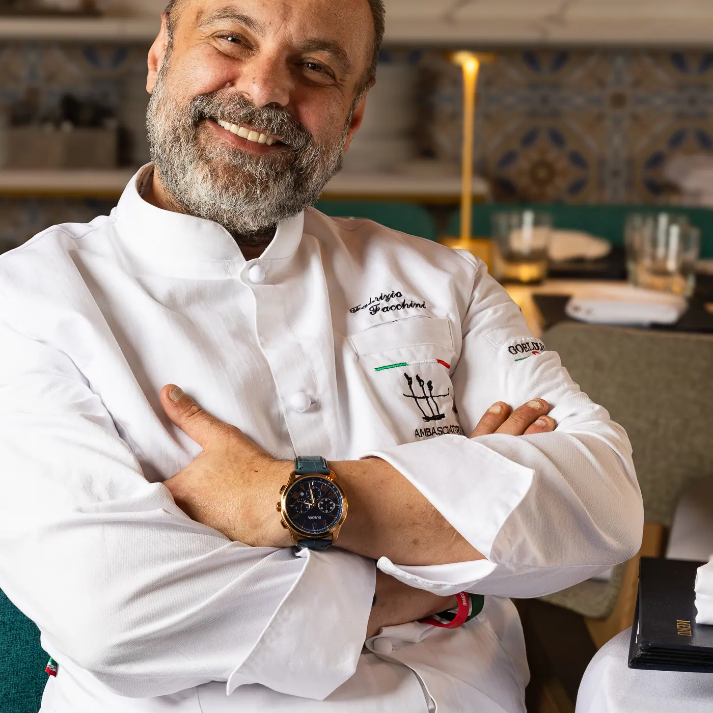 Chef Fabrizio Facchini, arms folded, in his whites