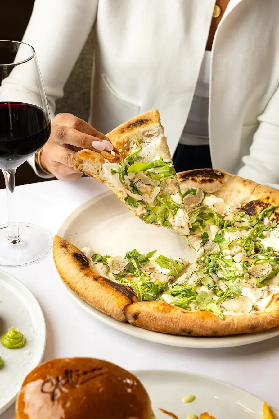 Neapolitan truffle pizza fresh from the wood oven