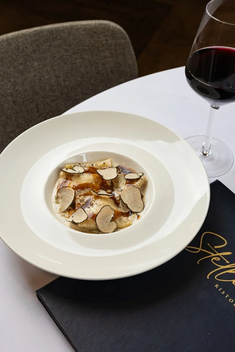 Shaved black truffle over pasta