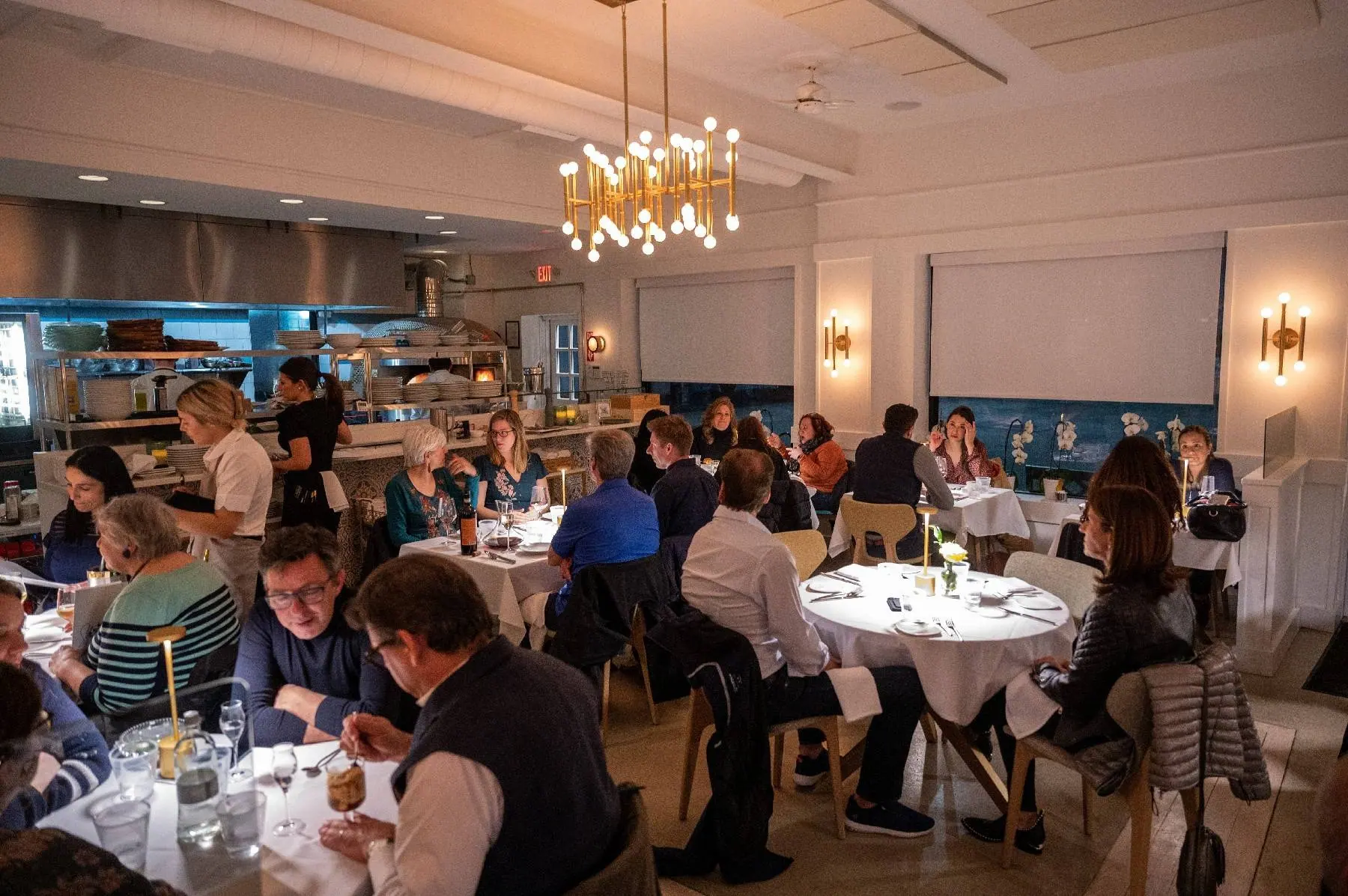 The candlelit forty-seat dining room